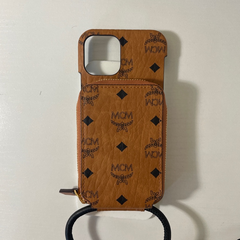 Mcm leather phone case with zippered wallet built in. For Iphone 12 pro.